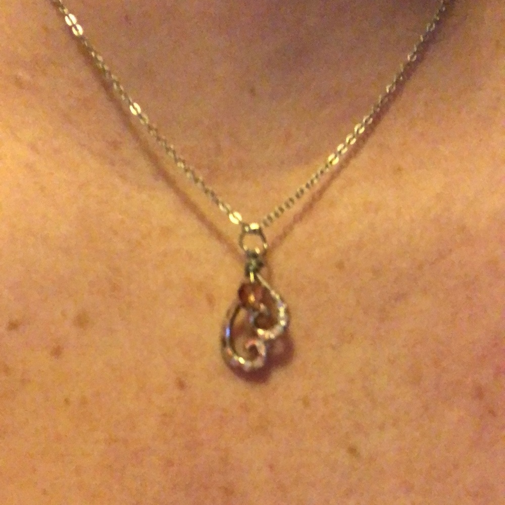 Pink bead & clear see through beaded pendants that attach to a heart pendant.